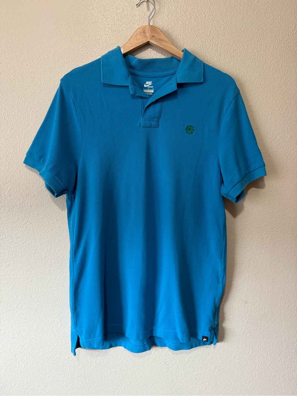 Nike Men’s Blue Polo Shirt with Clover Logo